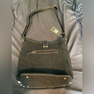 Myra bag never used. Black and white